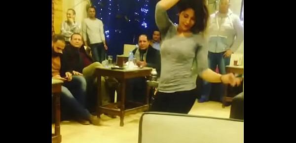  arab girl dancing with friends in Cafe